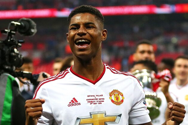 LONDON, ENGLAND - MAY 21:  Marcus Rashford of Manchester United celebrates his team's 1-2 victory at the end of extra time during The Emirates FA Cup final match between Manchester United and Crystal Palace at Wembley Stadium on May 21, 2016 in London, England.  (Photo by Catherine Ivill - AMA/Getty Images)