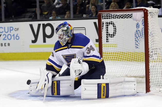 St. Louis Blues goalie Jake Allen stops a shot during the second period in Game 4 of the NHL hockey Stanley Cup Western Conference finals against the San Jose Sharks on Saturday, May 21, 2016, in San Jose, Calif. (AP Photo/Marcio Jose Sanchez)