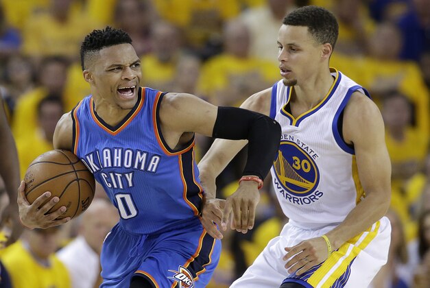 Oklahoma City Thunder guard Russell Westbrook (0) reacts as he is guarded by Golden State Warriors guard Stephen Curry (30) during the second half of Game 2 of the NBA basketball Western Conference finals in Oakland, Calif., Wednesday, May 18, 2016. The Warriors won 118-91. (AP Photo/Marcio Jose Sanchez) Oklahoma City Thunder guard Russell Westbrook (0) reacts as he is guarded by Golden State Warriors guard Stephen Curry (30) during the second half of Game 2 of the NBA basketball Western Conference finals in Oakland, Calif., Wednesday, May 18, 2016. The Warriors won 118-91. (AP Photo/Marcio Jose Sanchez)