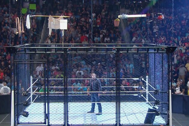 Dean Ambrose standing inside his own creation.