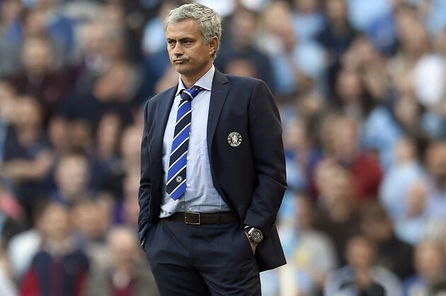 Chelsea's manager Jose Mourinho watches from the sidelines during their English Premier League soccer match against Manchester City at the Etihad Stadium in Manchester, England, Sunday Sept. 21, 2014. (AP Photo/Clint Hughes)