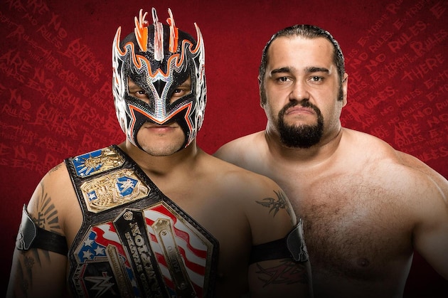 WWE wrestler Alexander Rusev, centre, fights against Ryback, left, during WWE Live India Tour, in New Delhi, Friday, Jan. 15, 2016. WWE returned to Indian after a gap of 13 years to entertain their fans. (AP Photo/Manish Swarup)