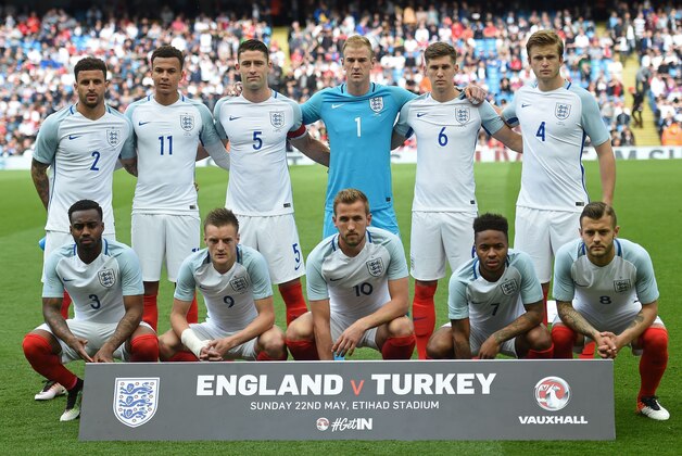 England players pose for a photograph (back row L-R), England's defender Kyle Walker, England's midfielder Dele Alli, England's defender Gary Cahill, England's goalkeeper Joe Hart, England's defender John Stones and England's midfielder Eric Dier, (front row L-R) England's defender Danny Rose, England's striker Jamie Vardy, England's striker Harry Kane, England's midfielder Raheem Sterling and England's midfielder Jack Wilshere ahead of the friendly football match between England and Turkey at the Etihad Stadium in Manchester, north west England, on May 22, 2016. / AFP / PAUL ELLIS / NOT FOR MARKETING OR ADVERTISING USE / RESTRICTED TO EDITORIAL USE         (Photo credit should read PAUL ELLIS/AFP/Getty Images)