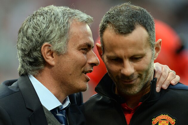 Chelsea's Portuguese manager Jose Mourinho (L) speaks to Manchester United's Welsh midfielder Ryan Giggs (R) ahead of the English Premier League football match between Manchester United and Chelsea at Old Trafford in Manchester, northwest England, on August 26, 2013. AFP PHOTO / ANDREW YATES
RESTRICTED TO EDITORIAL USE. No use with unauthorized audio, video, data, fixture lists, club/league logos or live services. Online in-match use limited to 45 images, no video emulation. No use in betting, games or single club/league/player publications. (Photo credit should read ANDREW YATES/AFP/Getty Images) Chelsea's Portuguese manager Jose Mourinho (L) speaks to Manchester United's Welsh midfielder Ryan Giggs (R) ahead of the English Premier League football match between Manchester United and Chelsea at Old Trafford in Manchester, northwest England, on August 26, 2013. AFP PHOTO / ANDREW YATES
RESTRICTED TO EDITORIAL USE. No use with unauthorized audio, video, data, fixture lists, club/league logos or live services. Online in-match use limited to 45 images, no video emulation. No use in betting, games or single club/league/player publications. (Photo credit should read ANDREW YATES/AFP/Getty Images)