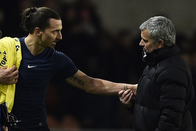 Paris Saint-Germain's Swedish midfielder Zlatan Ibrahimovic speaks with Chelsea's Portuguese manager Jose Mourinho (R) at the end of the UEFA Champions League round of 16 football match between Paris Saint-Germain (PSG) and Chelsea at the Parc des Princes stadium in Paris on February 17, 2015. AFP PHOTO / FRANCK FIFE        (Photo credit should read FRANCK FIFE/AFP/Getty Images)