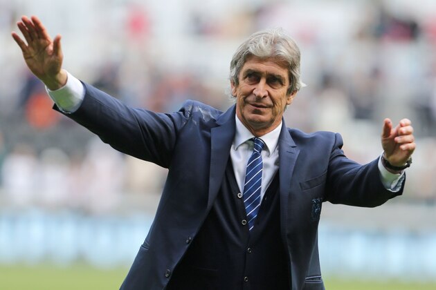 Manchester City's Chilean manager Manuel Pellegrini waves to supporters after the English Premier League football match between Swansea City and Manchester City at The Liberty Stadium in Swansea, south Wales on May 15, 2016.
The game finished 1-1. / AFP / GEOFF CADDICK / RESTRICTED TO EDITORIAL USE. No use with unauthorized audio, video, data, fixture lists, club/league logos or 'live' services. Online in-match use limited to 75 images, no video emulation. No use in betting, games or single club/league/player publications.  /         (Photo credit should read GEOFF CADDICK/AFP/Getty Images)