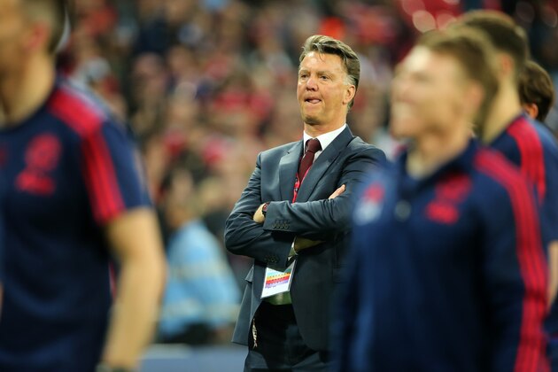 LONDON, ENGLAND - MAY 21: LONDON, ENGLAND - MAY 21: Louis van Gaal Manager / head coach of Manchester United watches his players celebrate victory after The Emirates FA Cup final match between Manchester United and Crystal Palace at Wembley Stadium on May 21, 2016 in London, England. (Photo by Matthew Ashton - AMA/Getty Images)