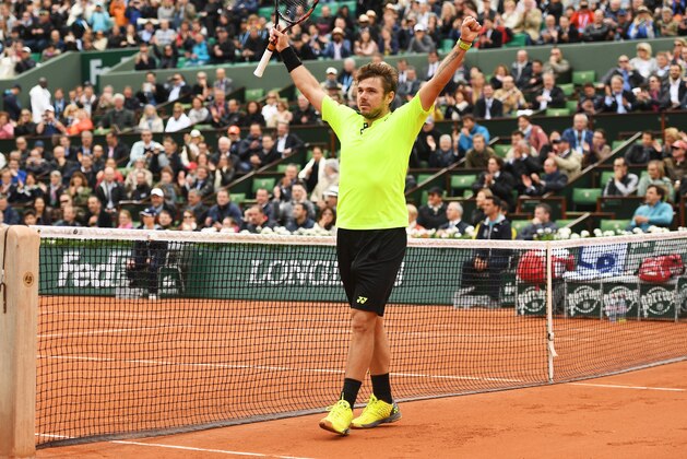PARIS, FRANCE - MAY 23:  Stan Wawrinka of Switzerland celebrates his victory during the Men's Singles first round match against Lukas Rosol of Czech Republic on day two of the 2016 French Open at Roland Garros on May 23, 2016 in Paris, France.  (Photo by Dennis Grombkowski/Getty Images)