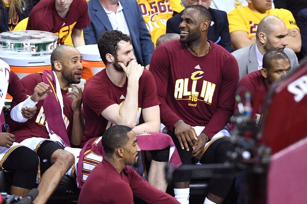 CLEVELAND, OH - MAY 17: Tristan Thompson #13, Dahntay Jones #30, Kevin Love #0, J.R. Smith #5, LeBron James #23 and James Jones #1 of the Cleveland Cavaliers look on from the bench in the fourth quarter against the Toronto Raptors  in game one of the Eastern Conference Finals during the 2016 NBA Playoffs at Quicken Loans Arena on May 17, 2016 in Cleveland, Ohio. NOTE TO USER: User expressly acknowledges and agrees that, by downloading and or using this photograph, User is consenting to the terms and conditions of the Getty Images License Agreement.  (Photo by Jason Miller/Getty Images)