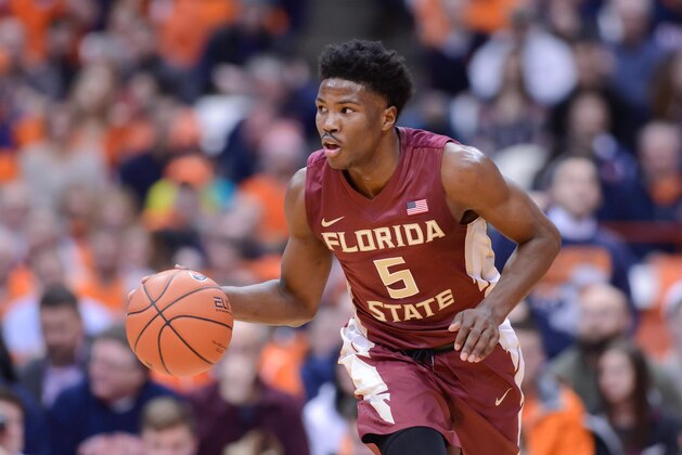 Feb 11, 2016; Syracuse, NY, USA; Florida State Seminoles guard Malik Beasley (5) brings the ball up court during the first half of a game against the Syracuse Orange at the Carrier Dome. Syracuse won  85-72. Mandatory Credit: Mark Konezny-USA TODAY Sports