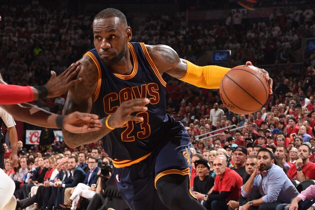 TORONTO, CANADA - MAY 21: LeBron James #23 of the Cleveland Cavaliers handles the ball against the Toronto Raptors in Game Three of the Eastern Conference Finals of the 2016 NBA Playoffs on May 21, 2016 at the Air Canada Centre in Toronto, Ontario, Canada. NOTE TO USER: User expressly acknowledges and agrees that, by downloading and/or using this Photograph, user is consenting to the terms and conditions of the Getty Images License Agreement. Mandatory Copyright Notice: Copyright 2016 NBAE (Photo by Ron Turenne/NBAE via Getty Images) (Photo by Ron Turenne/NBAE via Getty Images)