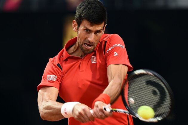 Croatia's Novak Djokovic returns the ball to England's Andy Murray during the final match of the ATP Tennis Open tournament at the Foro Italico in Rome on May 15, 2016.   / AFP / FILIPPO MONTEFORTE        (Photo credit should read FILIPPO MONTEFORTE/AFP/Getty Images)