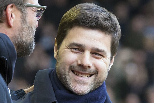 FILE - In this April 2, 2016 file photo, Tottenham's manager Mauricio Pochettino, right, greets Liverpool's manager Juergen Klopp before an English Premier League soccer match in Liverpool, England. Pochettino plans to extend his Tottenham contract until 2021. The Argentine, who arrived at Tottenham on a five-year contract in 2014, announced on Friday, April 29, 2016 he has verbally agreed to a new five-year deal. (AP Photo/Jon Super, File)