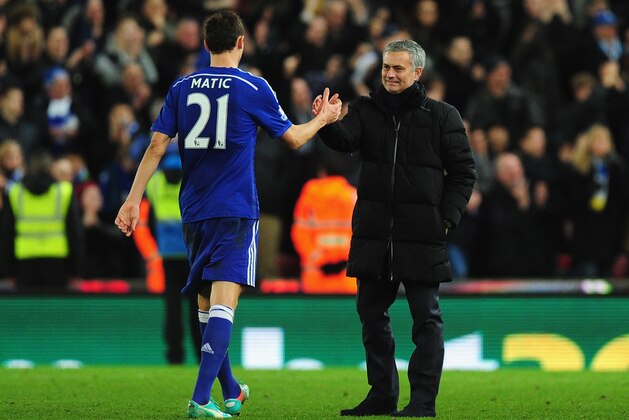 STOKE ON TRENT, ENGLAND - DECEMBER 22:  Chelsea player Nemanja Matic is congratulated by his mananger Jose Mourinho after the Barclays Premier League match between Stoke City and Chelsea at Britannia Stadium on December 22, 2014 in Stoke on Trent, England.  (Photo by Stu Forster/Getty Images)