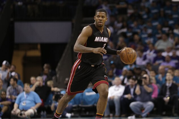 Miami Heat's Joe Johnson (2) brings the ball up the court against the Charlotte Hornets during the second half in Game 4 of an NBA basketball playoffs first-round series in Charlotte, N.C., Monday, April 25, 2016. The Hornets won 89-85. (AP Photo/Chuck Burton)