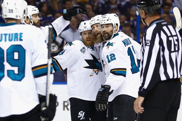 ST LOUIS, MO - MAY 23:  Joe Pavelski #8 of the San Jose Sharks celebrates with Joe Thornton #19, Patrick Marleau #12 and Brent Burns #88 after scoring a second period goal against the St. Louis Blues in Game Five of the Western Conference Final during the 2016 NHL Stanley Cup Playoffs at Scottrade Center on May 23, 2016 in St Louis, Missouri.  (Photo by Jamie Squire/Getty Images)