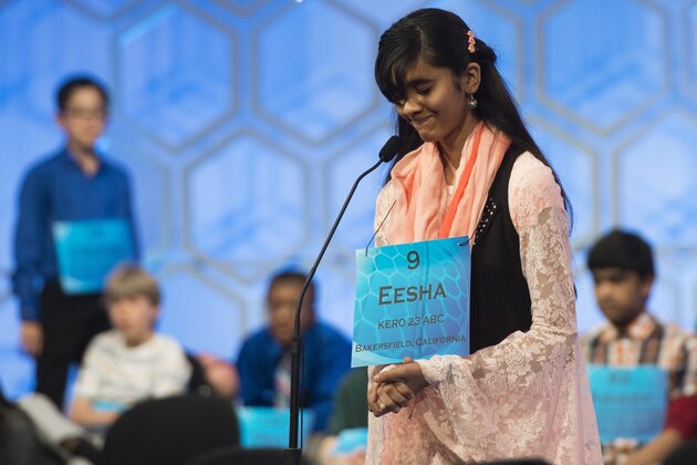 Eesha Sohail of Bakersfield, California, reacts after misspelling her word during the semifinal round of the 88th Annual Scripps National Spelling Bee at National Harbor in Oxon Hill, Maryland, May 28, 2015. AFP PHOTO / SAUL LOEB        (Photo credit should read SAUL LOEB/AFP/Getty Images)