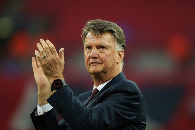 LONDON, ENGLAND - MAY 21: LONDON, ENGLAND - MAY 21: Louis van Gaal Manager / head coach of Manchester United watches his players celebrate victory after The Emirates FA Cup final match between Manchester United and Crystal Palace at Wembley Stadium on May 21, 2016 in London, England. (Photo by Matthew Ashton - AMA/Getty Images)