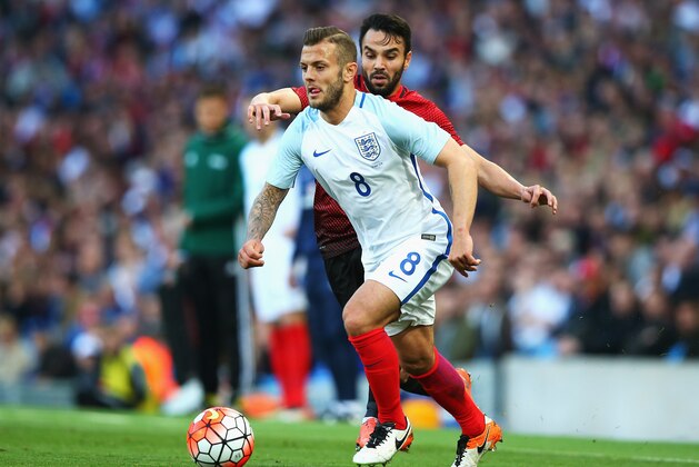 MANCHESTER, ENGLAND - MAY 22:  Jack Wilshere of England runs with the ball under prelssure from Volkan Sen of Turkey during the International Friendly match between England and Turkey at Etihad Stadium on May 22, 2016 in Manchester, England.  (Photo by Alex Livesey/Getty Images)