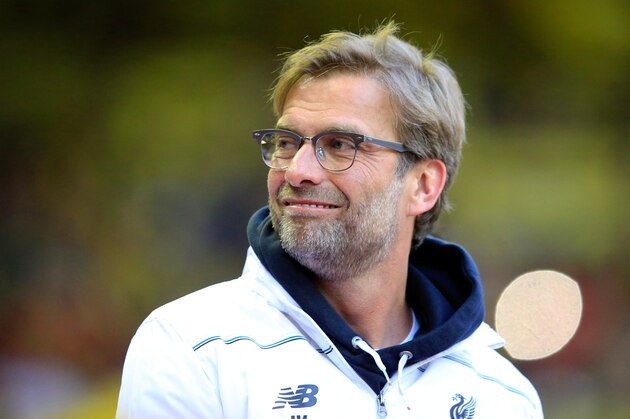 Liverpool manager Juergen Klopp smiles before the Europa League semifinal, second leg, soccer match between Liverpool and  Villarreal at Anfield Stadium, Liverpool, England, Thursday May 5, 2016. (AP Photo/Jon Super)