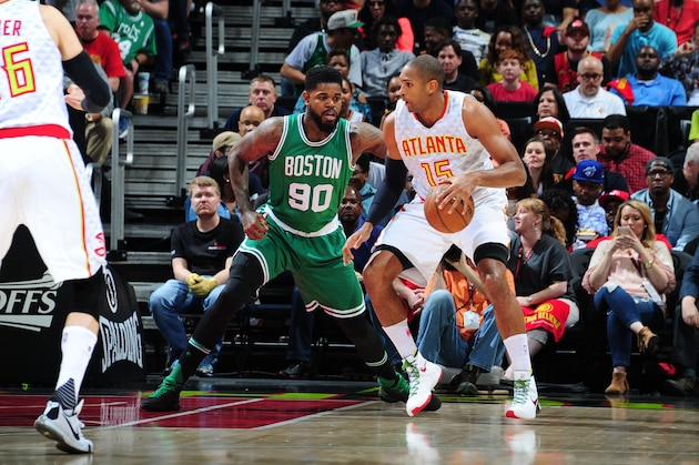 ATLANTA, GA - APRIL 26:  Al Horford #15 of the Atlanta Hawks handles the ball against Amir Johnson #90 of the Boston Celtics in Game Five of the Eastern Conference Quarterfinals during the 2016 NBA Playoffs on April 26, 2016 at Philips Arena in Atlanta, Georgia.  NOTE TO USER: User expressly acknowledges and agrees that, by downloading and/or using this Photograph, user is consenting to the terms and conditions of the Getty Images License Agreement. Mandatory Copyright Notice: Copyright 2016 NBAE (Photo by Scott Cunningham/NBAE via Getty Images)