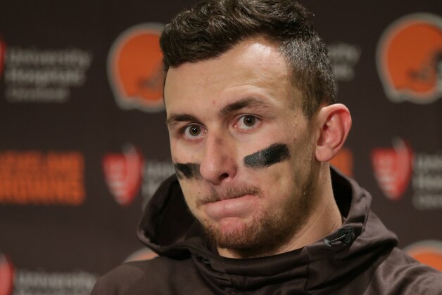 FILE - In this Dec. 20, 2015, file photo, Cleveland Browns quarterback Johnny Manziel speaks with media members following the team's 30-13 loss to the Seattle Seahawks in an NFL football game, in Seattle. A Dallas judge has set a $1,500 bond for former Cleveland Browns quarterback Johnny Manziel in his misdemeanor domestic assault case. (AP Photo/Scott Eklund, File)