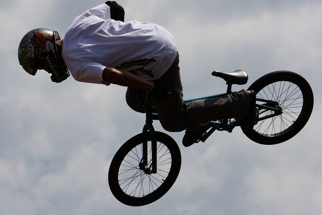 CHICAGO - JUNE 27: Dave Mirra, of Greenville, North Carolina, performs on his way to 1st place during the BMX Park Final of the Nike 6.0 BMX Open on June 27, 2009 at Grant Park in Chicago, Illinois. (Photo by Jonathan Daniel/Getty Images)