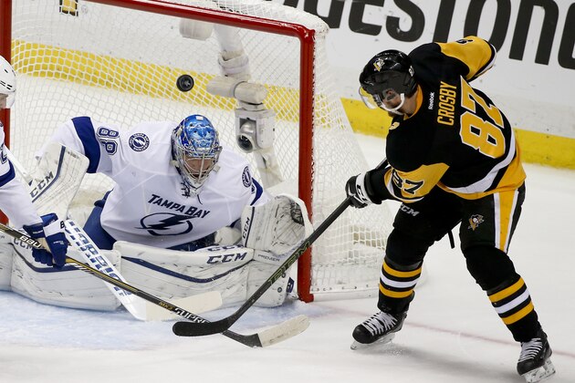 Pittsburgh Penguins' Sidney Crosby (87) has a shot deflected in front of Tampa Bay Lightning goalie Andrei Vasilevskiy (88) during the first period of Game 5 of the NHL hockey Stanley Cup Eastern Conference finals, Sunday, May 22, 2016, in Pittsburgh. (AP Photo/Gene J. Puskar)