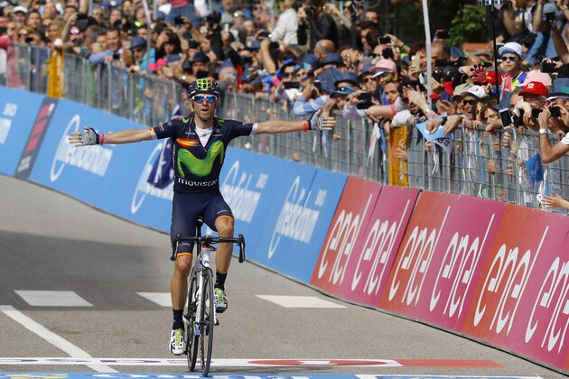 Spain's Alejandro Valverde of team Movistar celebrates as he crosses the finish line to win the 16th stage of the 99th Giro d'Italia, Tour of Italy, from Bressanone / Brixen to Andalo on May 24, 2016.  / AFP / LUK BENIES        (Photo credit should read LUK BENIES/AFP/Getty Images)