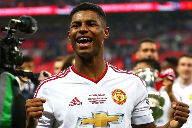 LONDON, ENGLAND - MAY 21:  Marcus Rashford of Manchester United celebrates his team's 1-2 victory at the end of extra time during The Emirates FA Cup final match between Manchester United and Crystal Palace at Wembley Stadium on May 21, 2016 in London, England.  (Photo by Catherine Ivill - AMA/Getty Images)