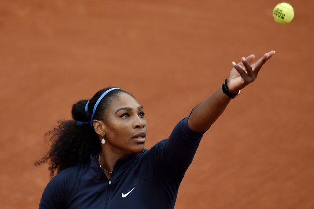 US Serena Williams serves the ball to Slovakia's Magdalena Rybarikova during their women's first round match at the Roland Garros 2016 French Tennis Open in Paris on May 24, 2016. / AFP / PHILIPPE LOPEZ        (Photo credit should read PHILIPPE LOPEZ/AFP/Getty Images)