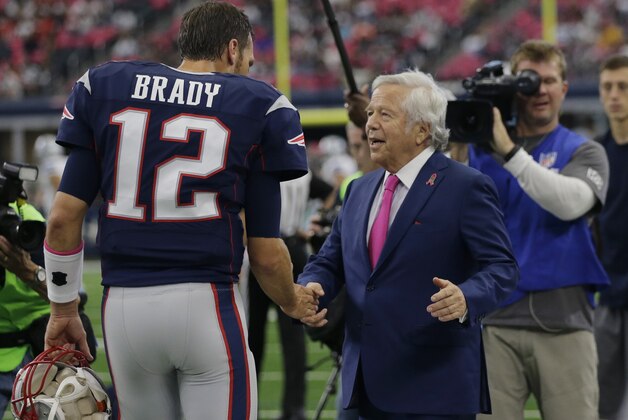 New England Patriots owner Robert Kraft, right, talks with quarterback Tom Brady (12) before an NFL football game against the Dallas Cowboys, Sunday, Oct. 11, 2015, in Arlington, Texas. (AP Photo/Tim Sharp)