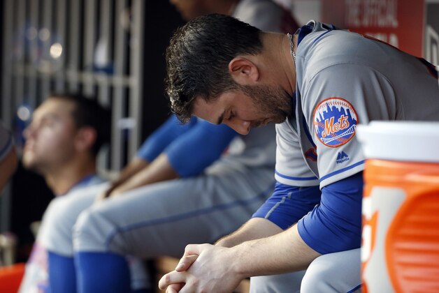 New York Mets starting pitcher Matt Harvey sits in the dugout during the fourth inning of a baseball game against the Washington Nationals at Nationals Park, Tuesday, May 24, 2016, in Washington. (AP Photo/Alex Brandon)