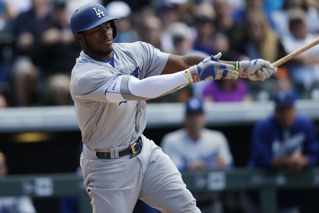 Los Angeles Dodgers right fielder Yasiel Puig (66) in the third inning of a baseball game Sunday, April 24, 2016, in Denver. The Dodgers won 12-10. (AP Photo/David Zalubowski)