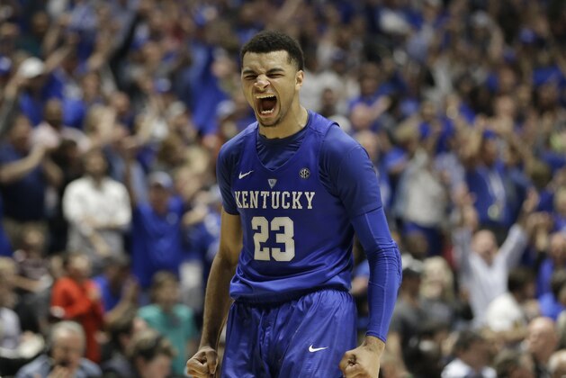 Kentucky's Jamal Murray (23) reacts after a basket against Texas A&M during overtime of an NCAA college basketball game in the championship of the Southeastern Conference tournament in Nashville, Tenn., Sunday, March 13, 2016. Kentucky won 82-77. (AP Photo/Mark Humphrey)