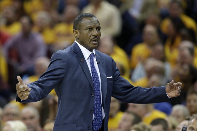 Toronto Raptors head coach Dwane Casey reacts against the Cleveland Cavaliers during the first half of Game 1 of the NBA basketball Eastern Conference finals, Tuesday, May 17, 2016, in Cleveland. (AP Photo/Tony Dejak)
