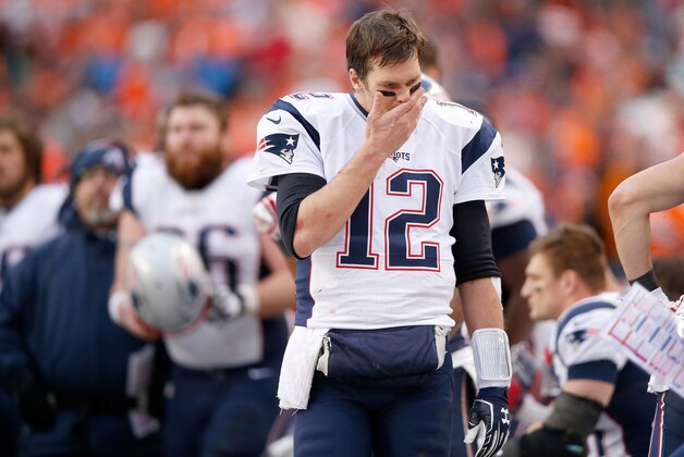 DENVER, CO - JANUARY 24:  Tom Brady #12 of the New England Patriots reacts in the second half against the Denver Broncos in the AFC Championship game at Sports Authority Field at Mile High on January 24, 2016 in Denver, Colorado.  (Photo by Ezra Shaw/Getty Images)
