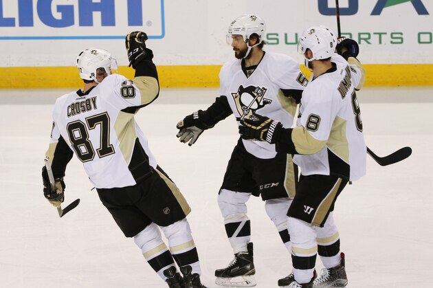 Pittsburgh Penguins center Sidney Crosby (87) celebrates his goal with teammates Kris Letang (58) and Brian Dumoulin (8) during the second period of Game 6 of the NHL hockey Stanley Cup Eastern Conference finals against the Tampa Bay Lightning, Tuesday, May 24, 2016, in Tampa, Fla. (AP Photo/Brian Blanco) Pittsburgh Penguins center Sidney Crosby (87) celebrates his goal with teammates Kris Letang (58) and Brian Dumoulin (8) during the second period of Game 6 of the NHL hockey Stanley Cup Eastern Conference finals against the Tampa Bay Lightning, Tuesday, May 24, 2016, in Tampa, Fla. (AP Photo/Brian Blanco)