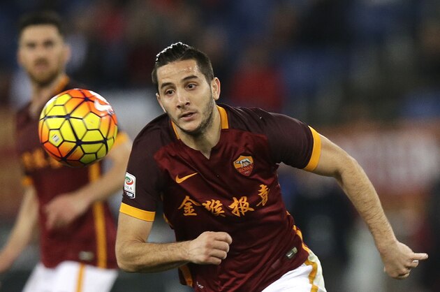 Roma’s Kostas Manolas wears the team jersey bearing a Chinese writing which reads: