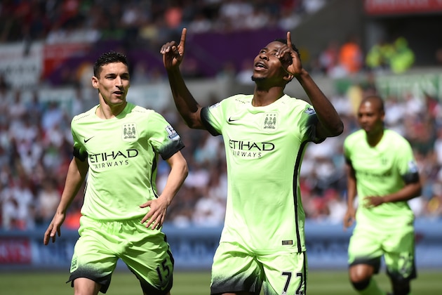 SWANSEA, WALES - MAY 15: Kelechi Iheanacho of Manchester City celebrates scoring his team's first goal during the Barclays Premier League match between Swansea City and Manchester City at the Liberty Stadium on May 15, 2016 in Swansea, Wales.