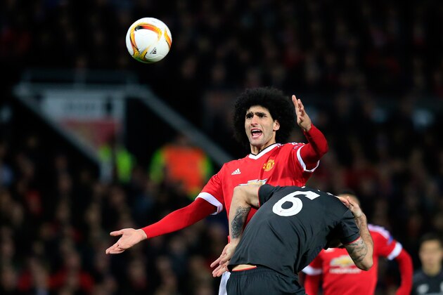 United’s Marouane Fellaini gestures during the Europa League round of 16, second leg, soccer match between  Manchester United and Liverpool at Old Trafford Stadium in Manchester, England, Thursday March 17, 2016. (AP Photo/Jon Super)