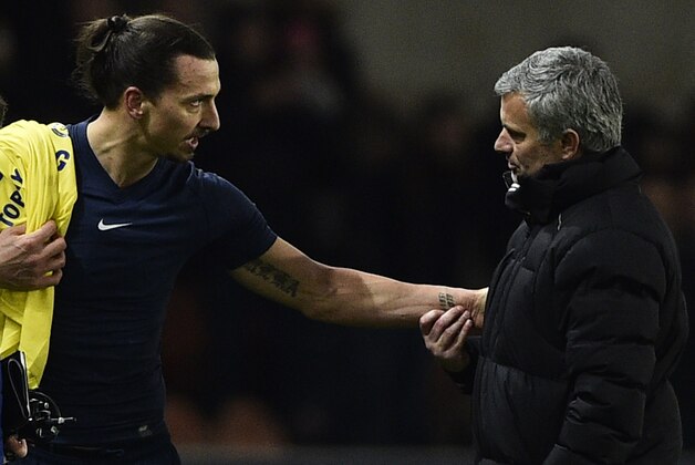 Paris Saint-Germain's Swedish midfielder Zlatan Ibrahimovic speaks with Chelsea's Portuguese manager Jose Mourinho (R) at the end of the UEFA Champions League round of 16 football match between Paris Saint-Germain (PSG) and Chelsea at the Parc des Princes stadium in Paris on February 17, 2015. AFP PHOTO / FRANCK FIFE        (Photo credit should read FRANCK FIFE/AFP/Getty Images)