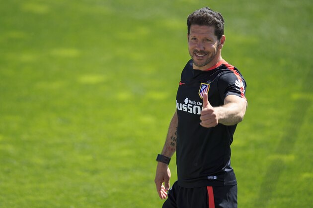 MADRID, SPAIN - MAY 21: Head coach Diego Pablo Simeone gives the ok to the audience as he leaves the training session during the Club Atletico de Madrid Open Media Day ahead of the UEFA Champions League Final match against Real Madrid CF on May 21, 2016 in Majadahonda, Spain.