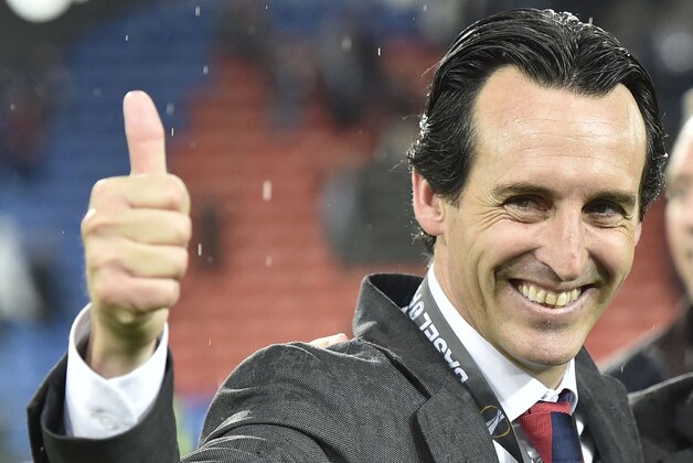 Sevilla head coach Unai Emery celebrates after winning the Europa League final soccer match between Liverpool and Sevilla in Basel, Switzerland, Wednesday, May 18, 2016. Sevilla won the match 3-1. (AP Photo/Martin Meissner)