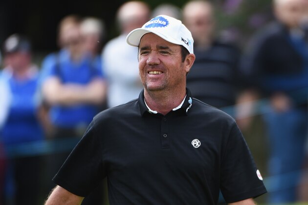 VIRGINIA WATER, ENGLAND - MAY 26:  Scott Hend of Australia reacts on the 18th green during day one of the BMW PGA Championship at Wentworth on May 26, 2016 in Virginia Water, England.  (Photo by Ross Kinnaird/Getty Images)