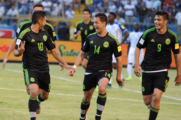 (L to R) Mexico's Jesus Corona, Javier Hernandez and Raul Jimenez celebrate after scoring against Honduras during the Russia 2018 FIFA World Cup Concacaf Qualifiers football match, in San Pedro Sula, on November 17, 2015.   AFP PHOTO / ORLANDO SIERRA        (Photo credit should read ORLANDO SIERRA/AFP/Getty Images)