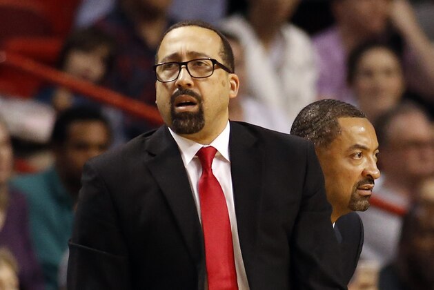 Miami Heat assistant coach David Fizdale looks on during second half action of an NBA basketball game against the New Orleans Pelicans, Friday, Dec. 25, 2015, in Miami. The Heat defeated the Pelicans 94-88 in overtime. (AP Photo/Joel Auerbach)
