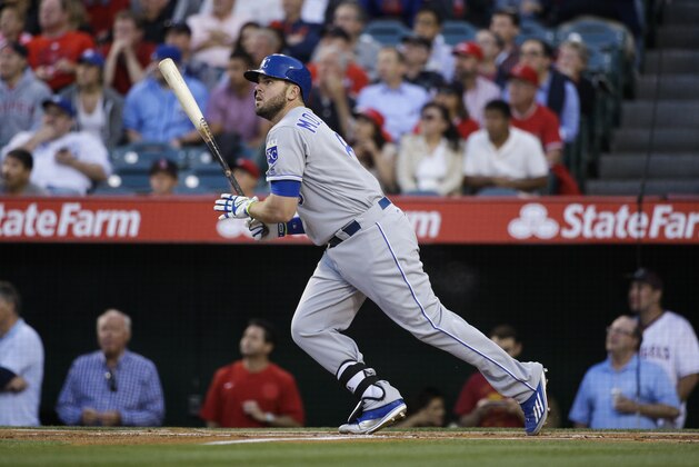 Kansas City Royals' Mike Moustakas watches his home run during the first inning of a baseball game against the Los Angeles Angels, Tuesday, April 26, 2016, in Anaheim, Calif. (AP Photo/Jae C. Hong)