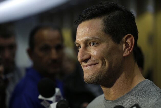 New York Giants punter Steve Weatherford speaks to reporters after organized team activity in East Rutherford, N.J., Monday, June 1, 2015. Weatherford said he's thankful for being unhurt early Monday after totaling a rented car on the New Jersey Turnpike as he tried to return home for practice from visiting his newborn daughter in California. (AP Photo/Seth Wenig)