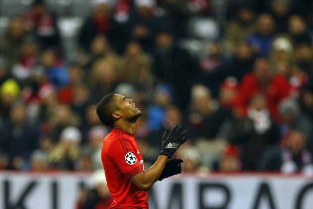 Bayern's Douglas Costa gestures during the Champions League Group F soccer match between FC Bayern Munich and Olympiakos Piraeus in Munich, Germany, Tuesday Nov. 24, 2015. (AP Photo/Matthias Schrader)